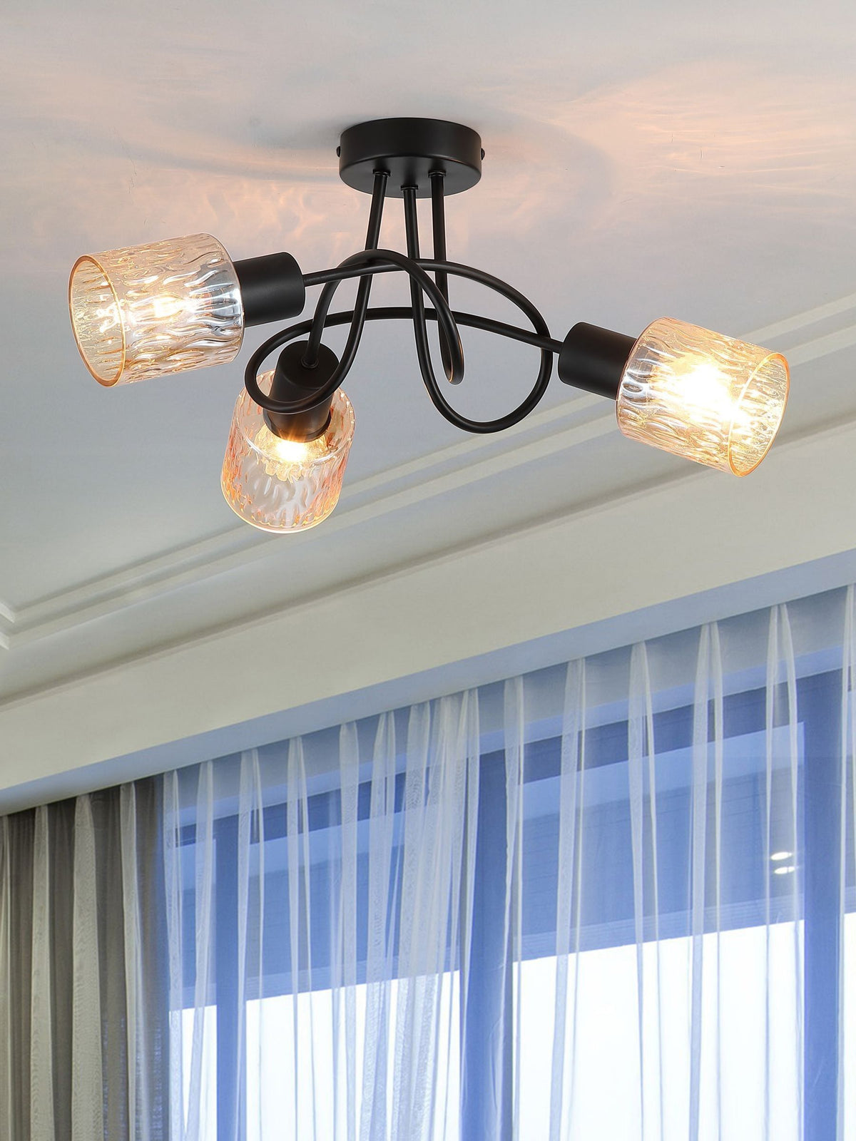 Searchlight amber and black three-light ceiling lamp, imported from the UK