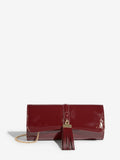 Lipsy burgundy red tassel trim clutch bag, UK version