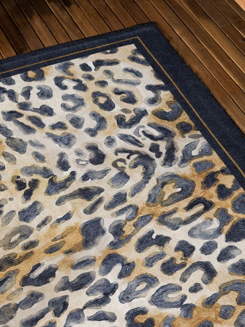 Paoletti leopard print indoor outdoor rug 120x170cm, imported from the UK