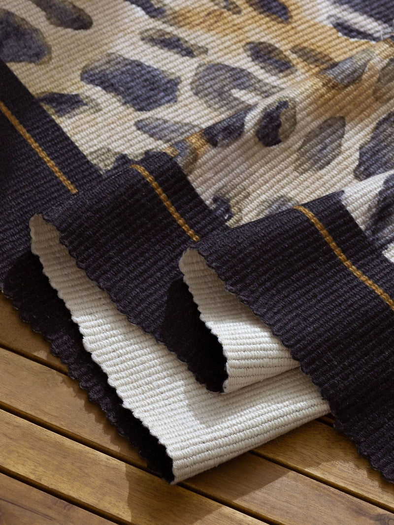Paoletti leopard print indoor outdoor rug 120x170cm, imported from the UK