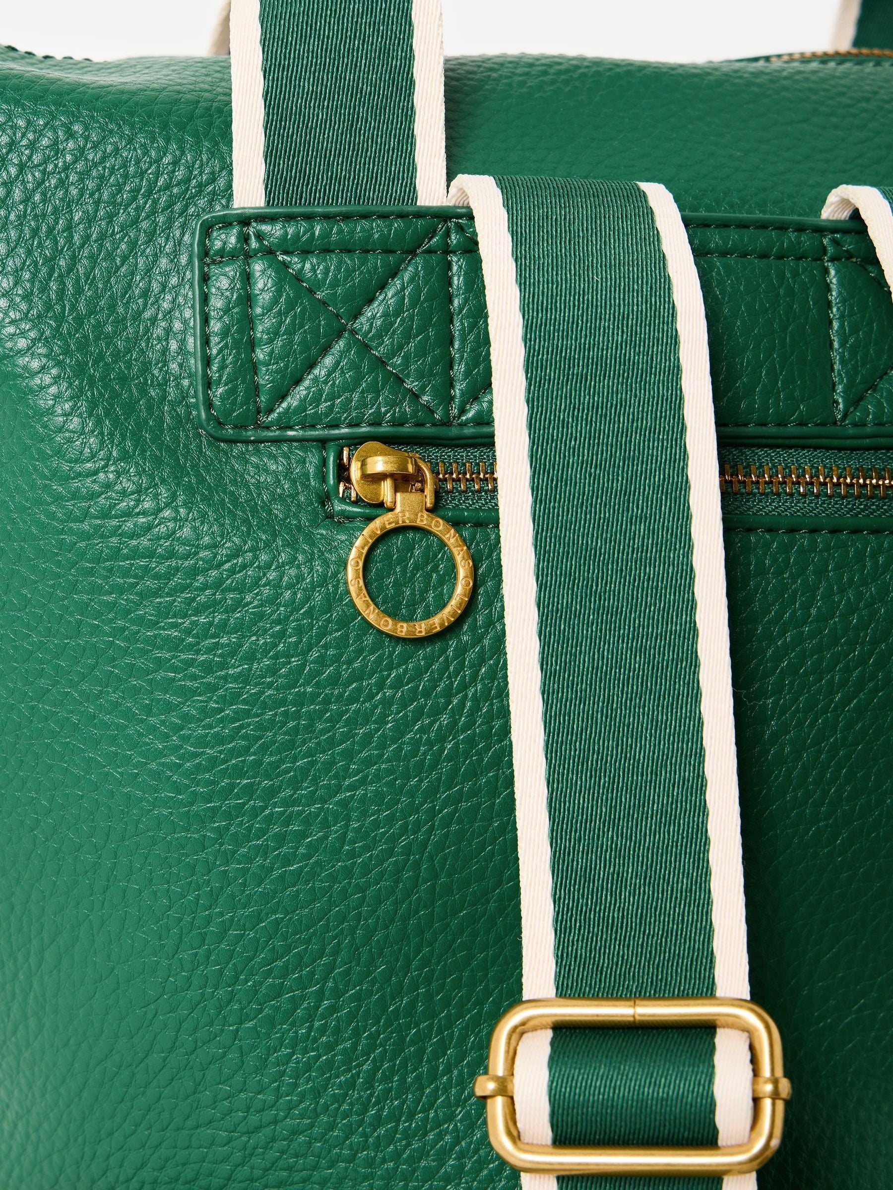 Oliver Bonas green slouch backpack with gold hardware (British brand)