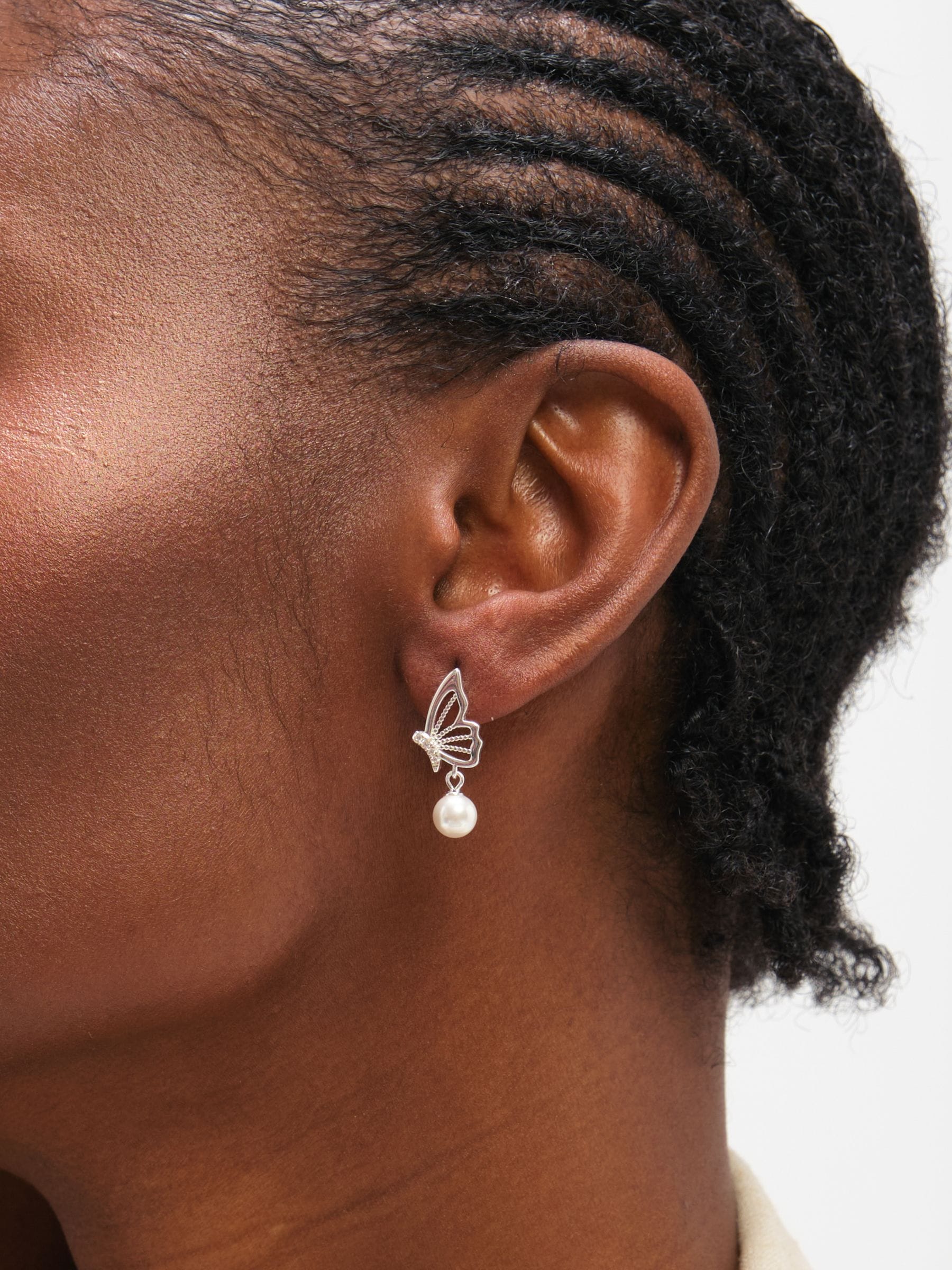 Inicio polished butterfly pearl drop earrings (British brand)