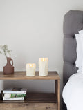 Lights4fun dripping wax LED pillar candles 10cm and 15cm, imported from the UK