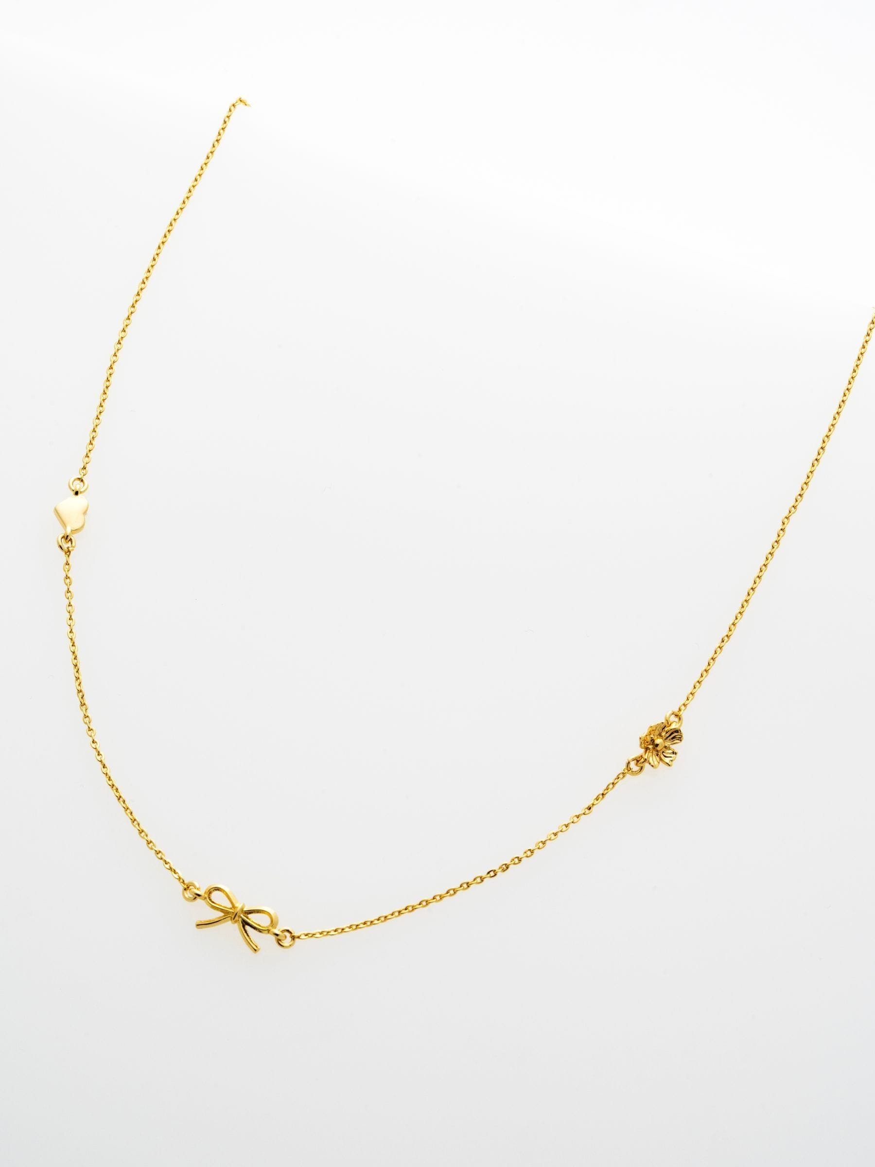 Ted Baker Iona Mini Icons necklace gold tone, imported from the UK