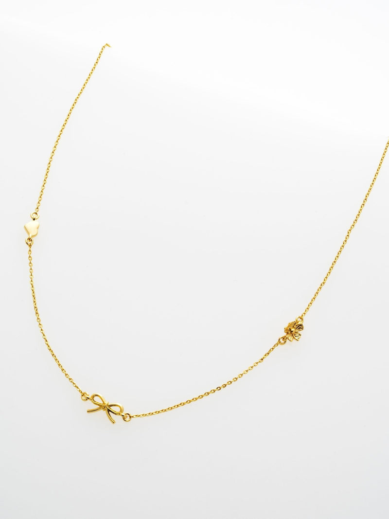 Ted Baker Iona Mini Icons necklace gold tone, imported from the UK