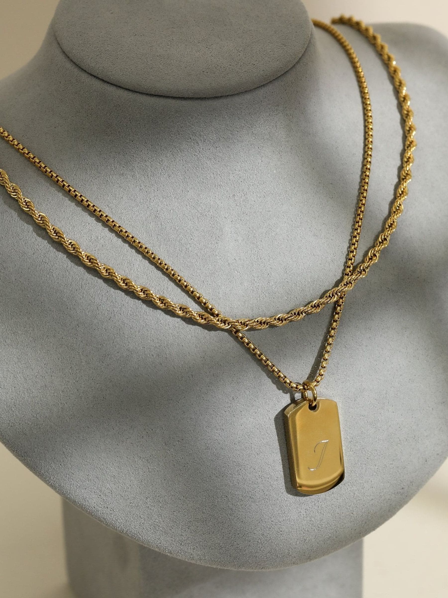 Inicio gold tone waterproof dog tag necklace, UK version