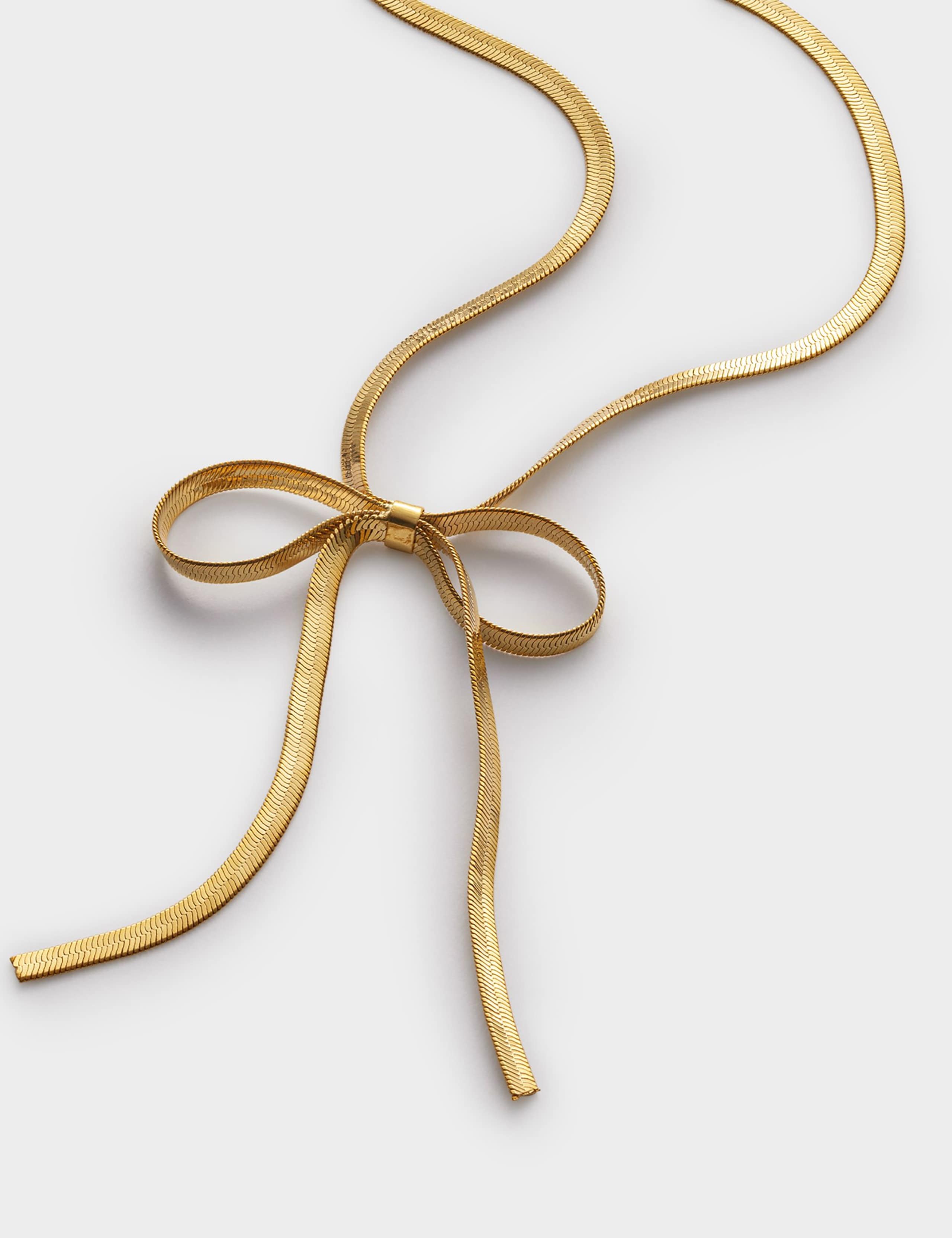 Katie Loxton gold coated ribbon bow necklace, UK version