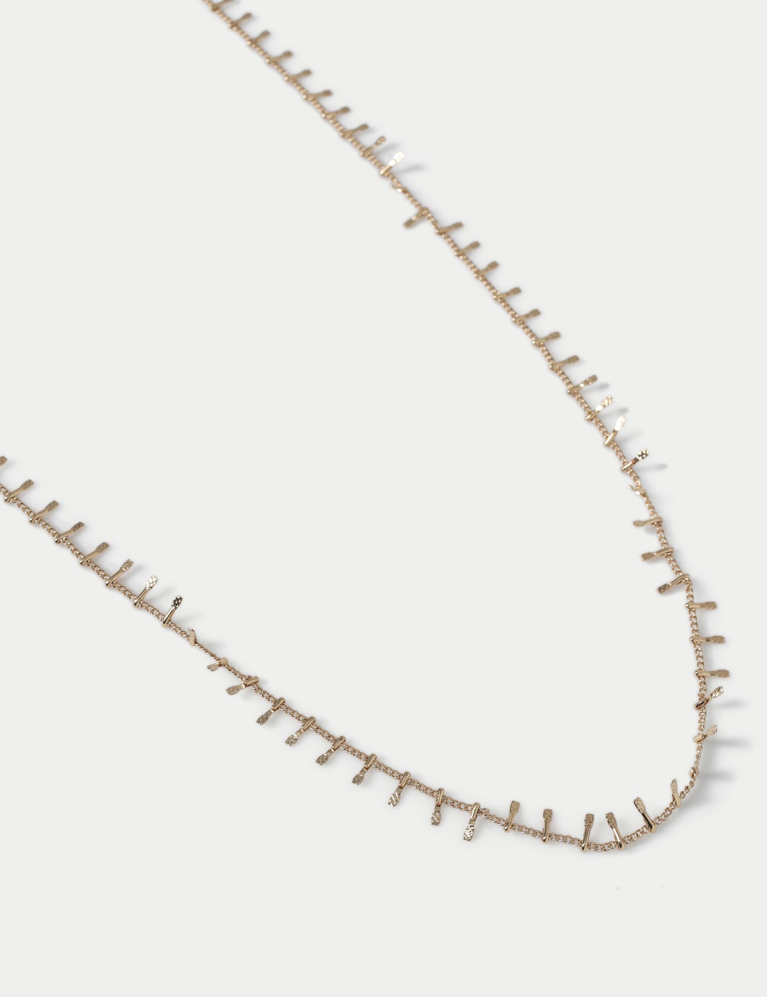 Gold tone long necklace with edge detail (British brand)