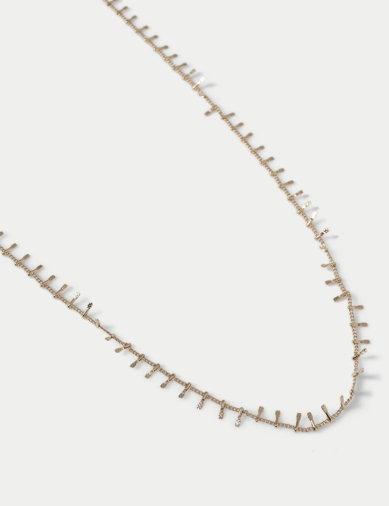Gold tone long necklace with edge detail (British brand)