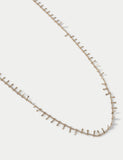 Gold tone long necklace with edge detail (British brand)