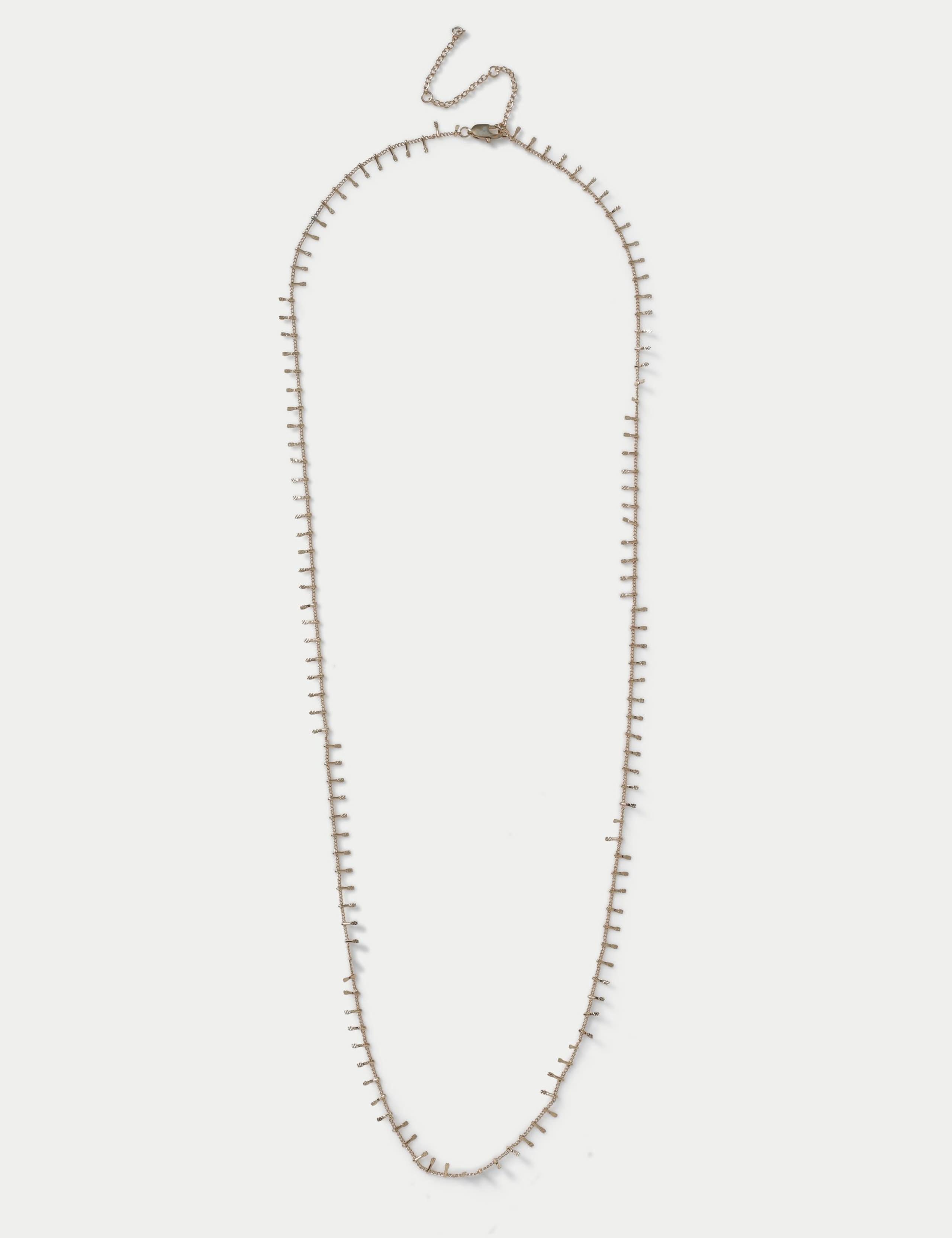 Gold tone long necklace with edge detail (British brand)