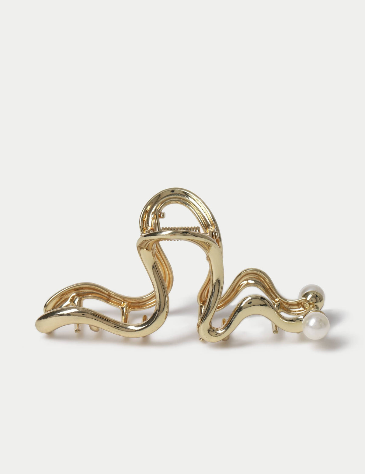 Gold tone and pearl hair claw - British product