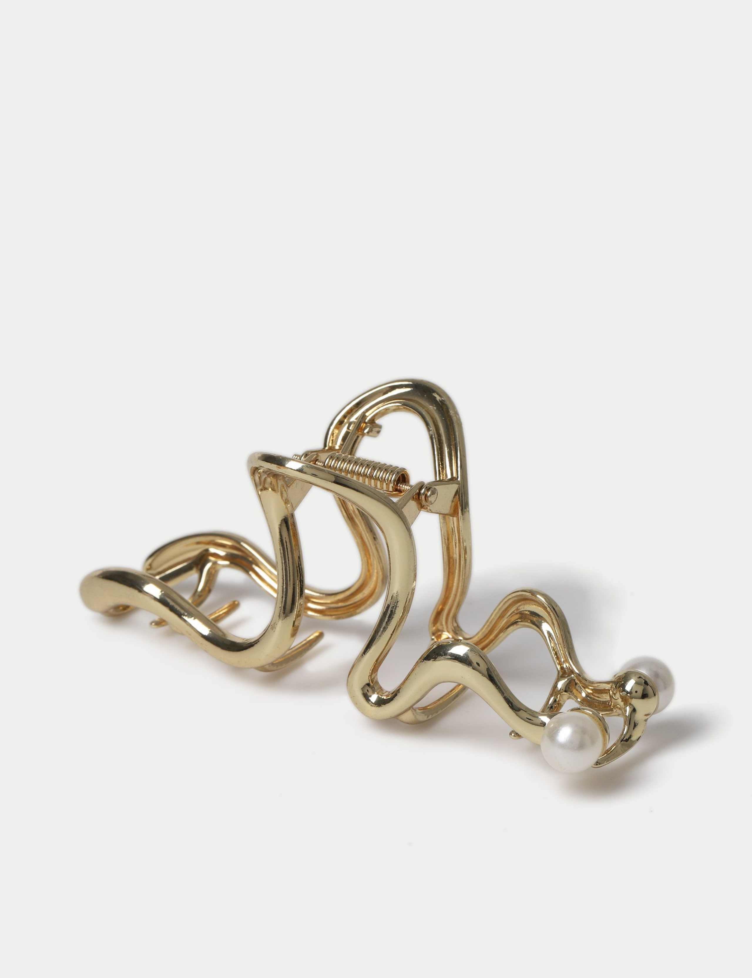 Gold tone and pearl hair claw - British product