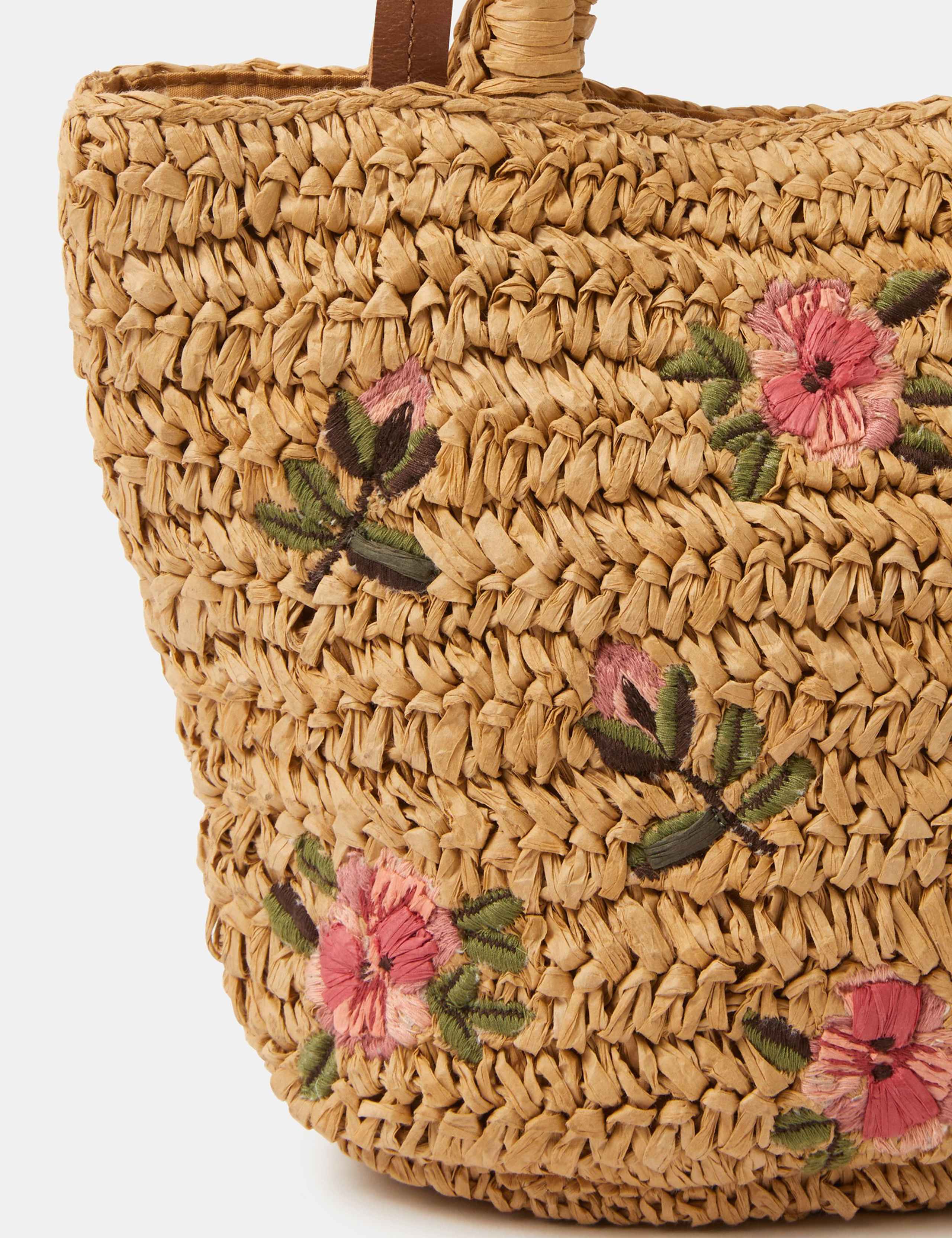 Accessorize natural raffia grab bag with floral embroidery (British brand)