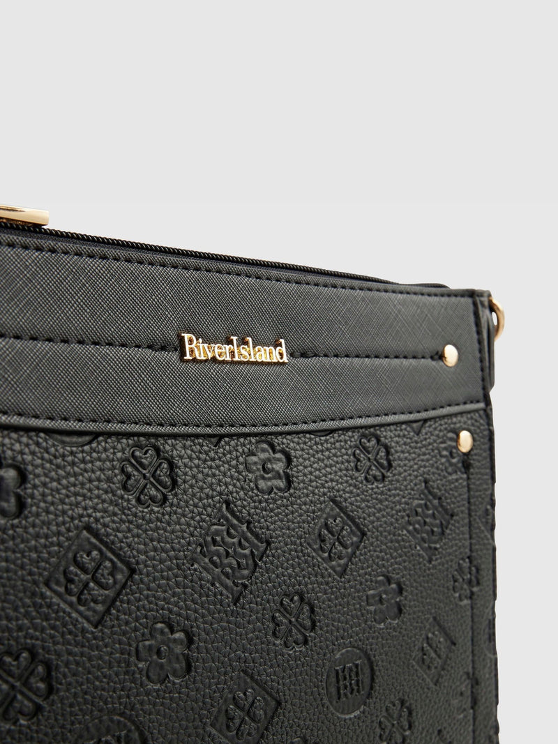 River Island black monogram embossed messenger bag, UK version