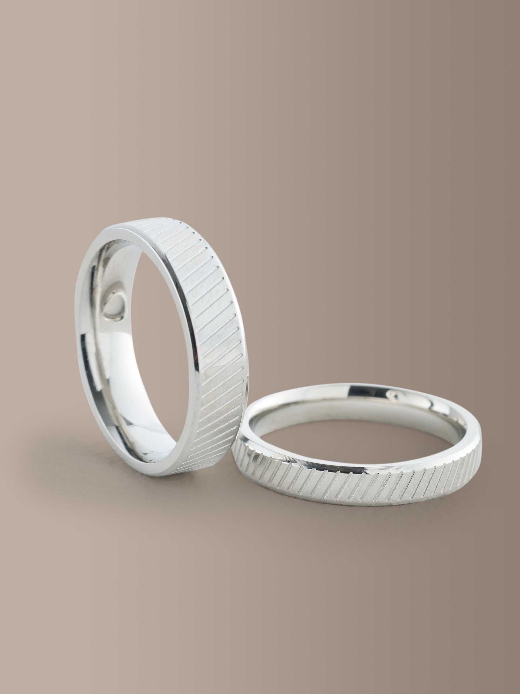 Silver tone stainless steel etched ring pack (British brand)