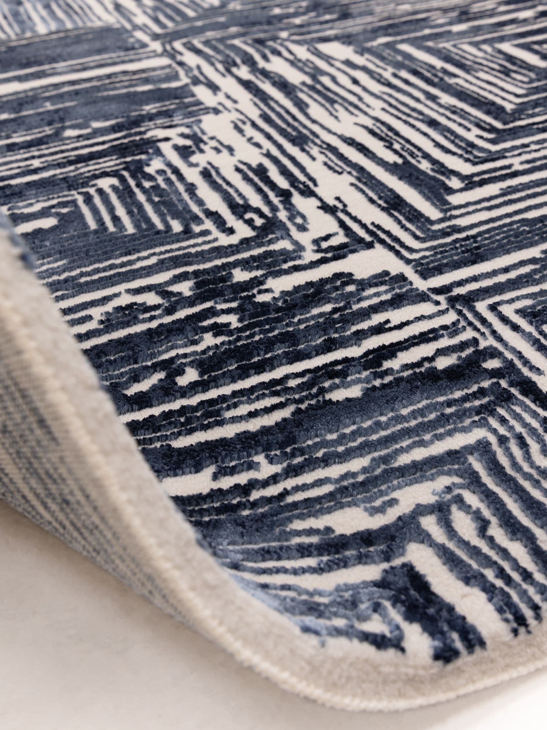 Blue Kuza portrait lustre rug (British brand)