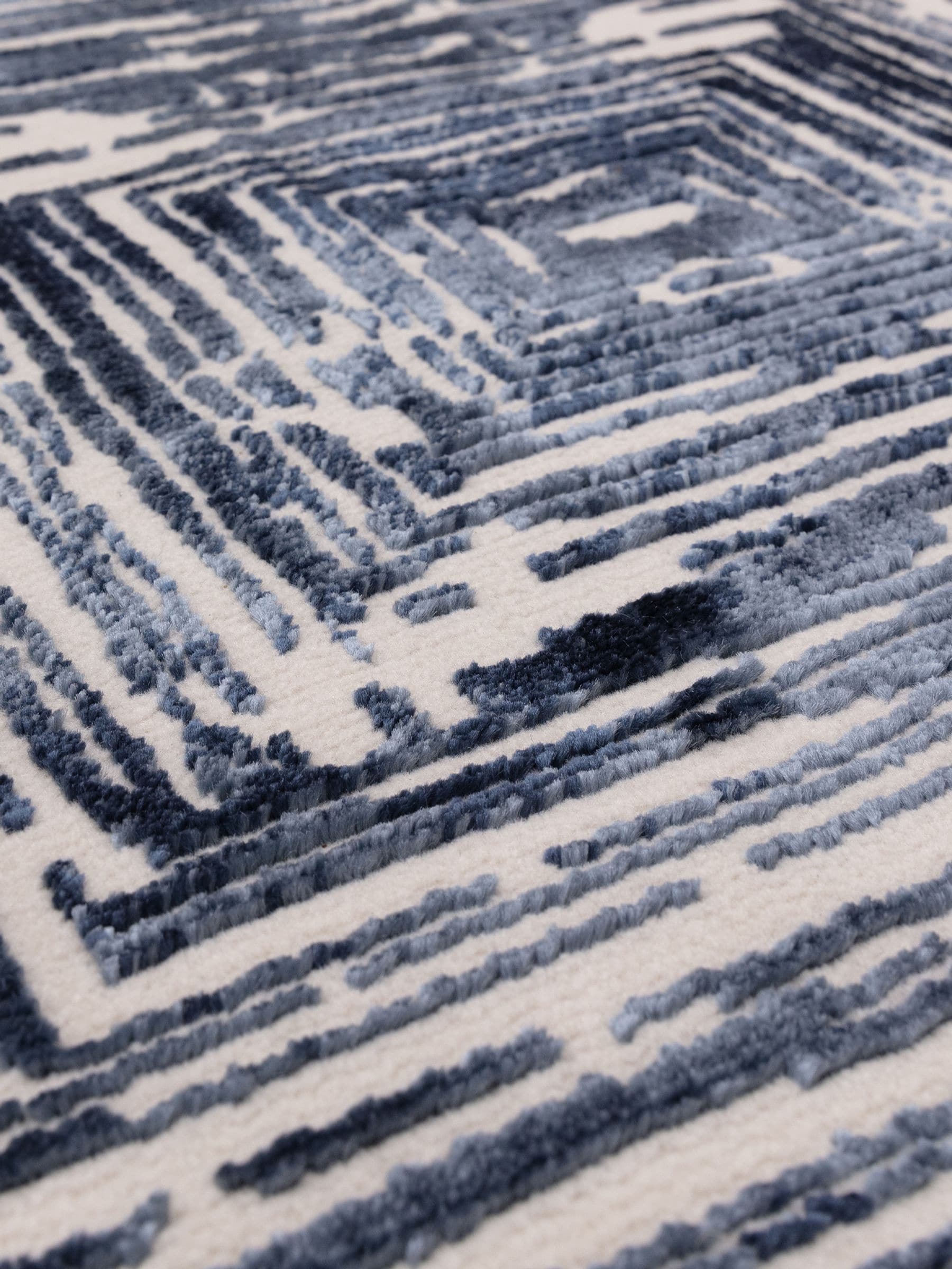 Blue Kuza portrait lustre rug (British brand)
