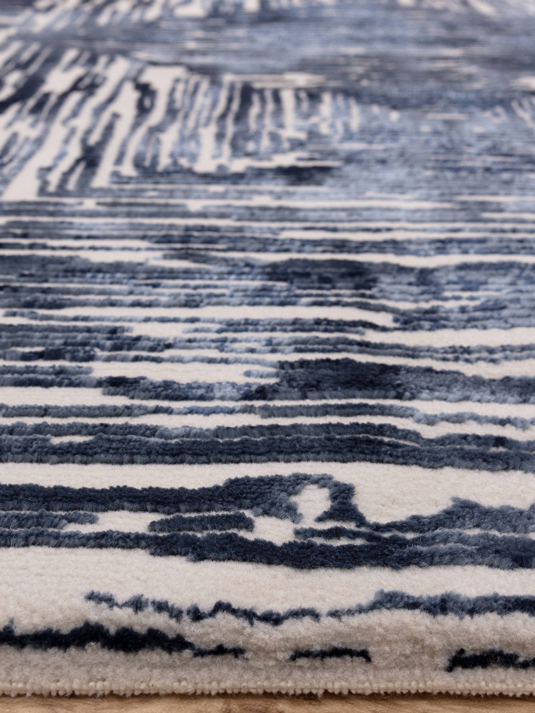 Blue Kuza portrait lustre rug (British brand)