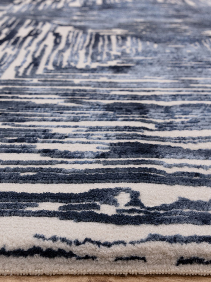 Blue Kuza portrait lustre rug (British brand)