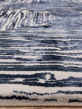 Blue Kuza portrait lustre rug (British brand)
