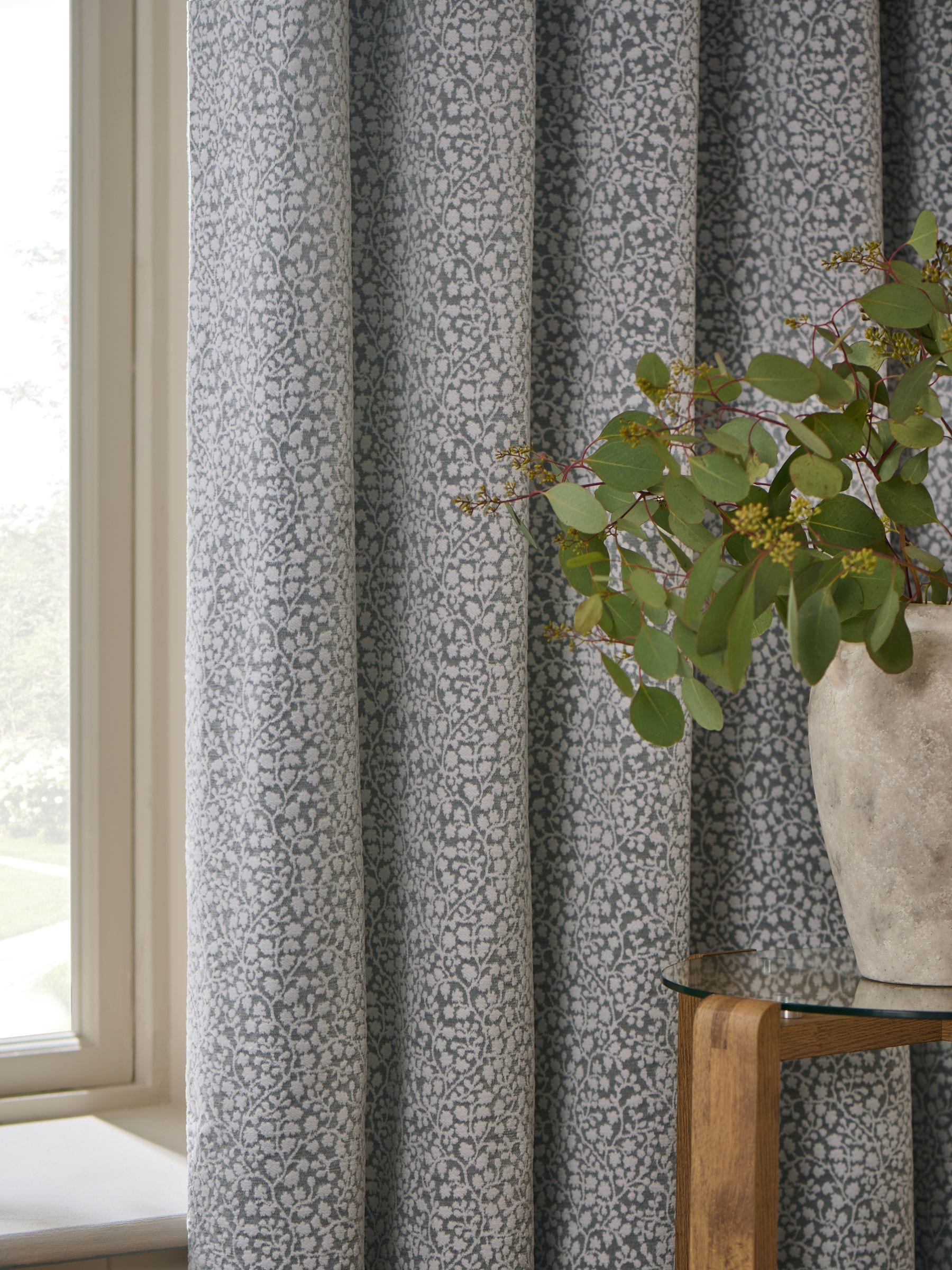 Blue floral chenille eyelet lined curtains, UK version