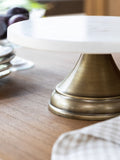 Garden Trading white marble cake stand with antique brass base, imported from the UK
