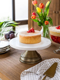 Garden Trading white marble cake stand with antique brass base, imported from the UK