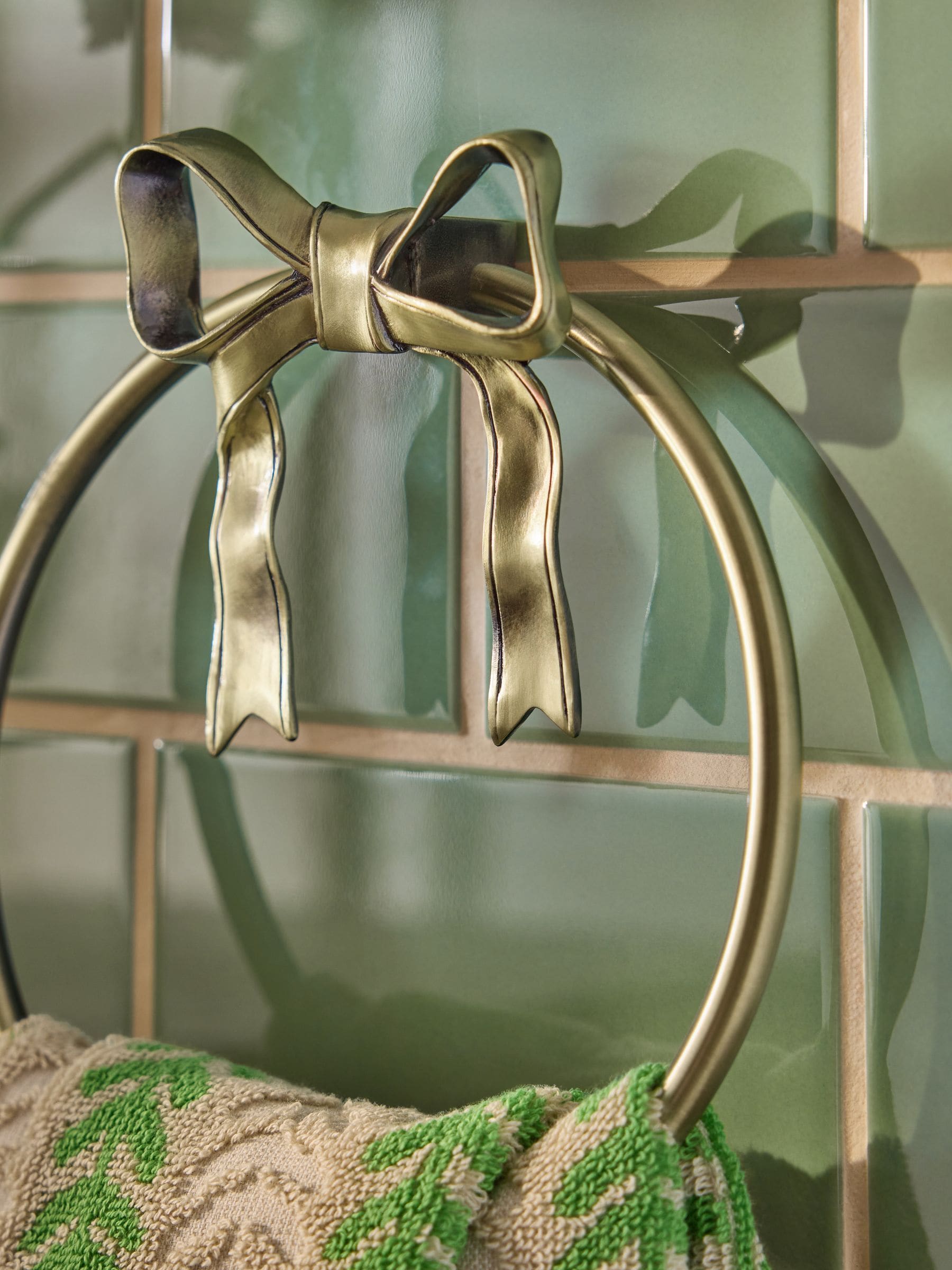 Gold bow towel ring bathroom accessory, UK version