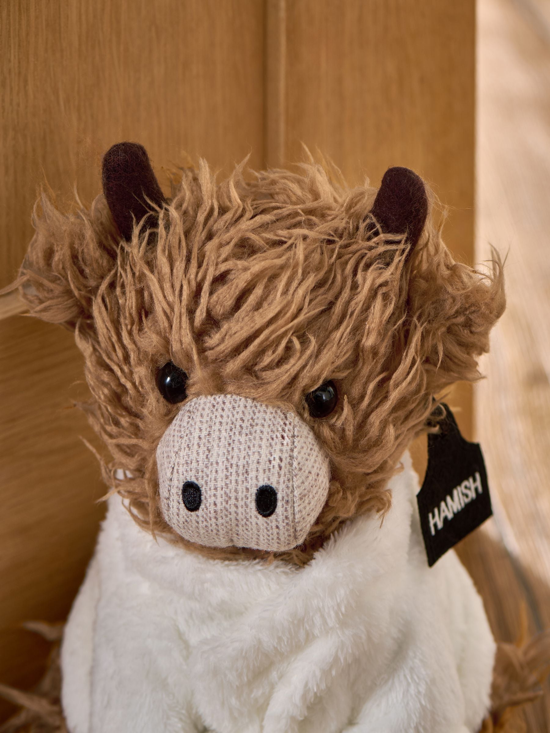 Natural Pamper Hamish Highland Cow doorstop, imported from the UK