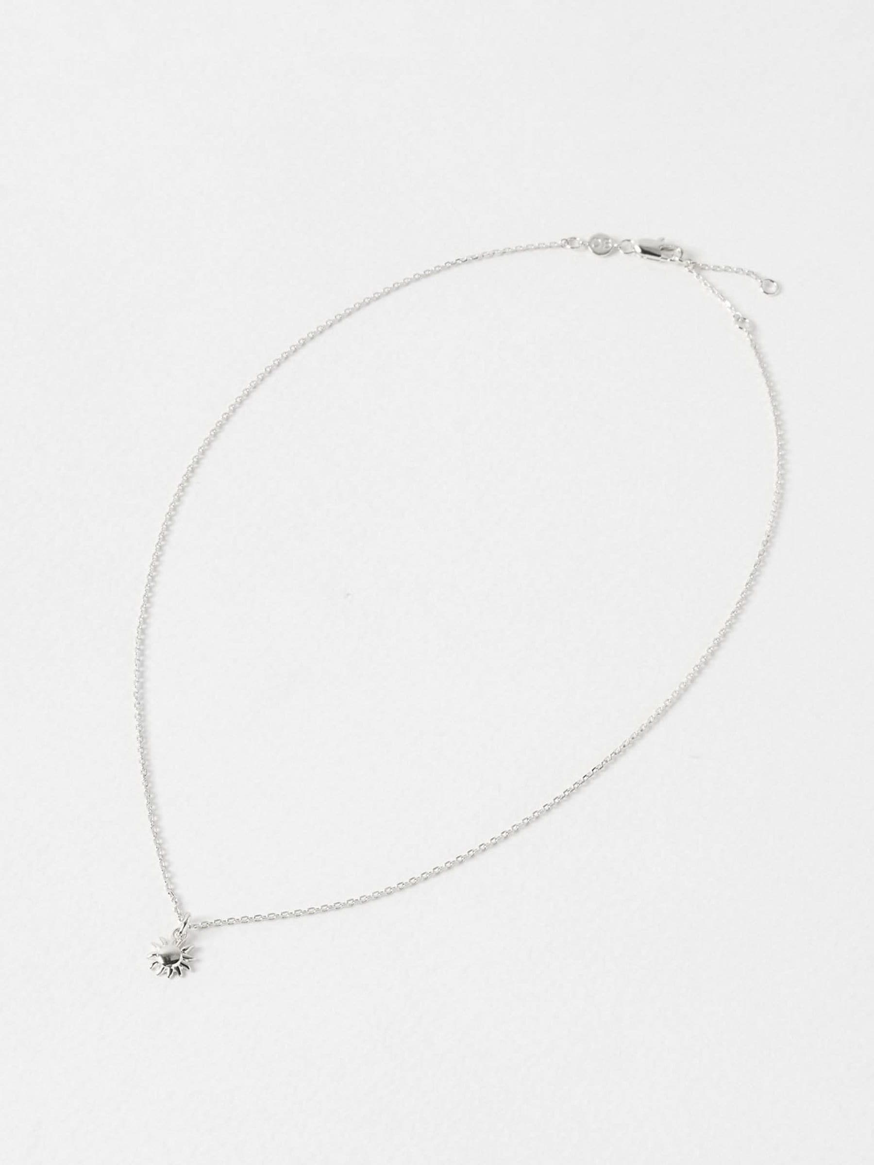 Oliver Bonas sterling silver sun charm pendant necklace, UK version