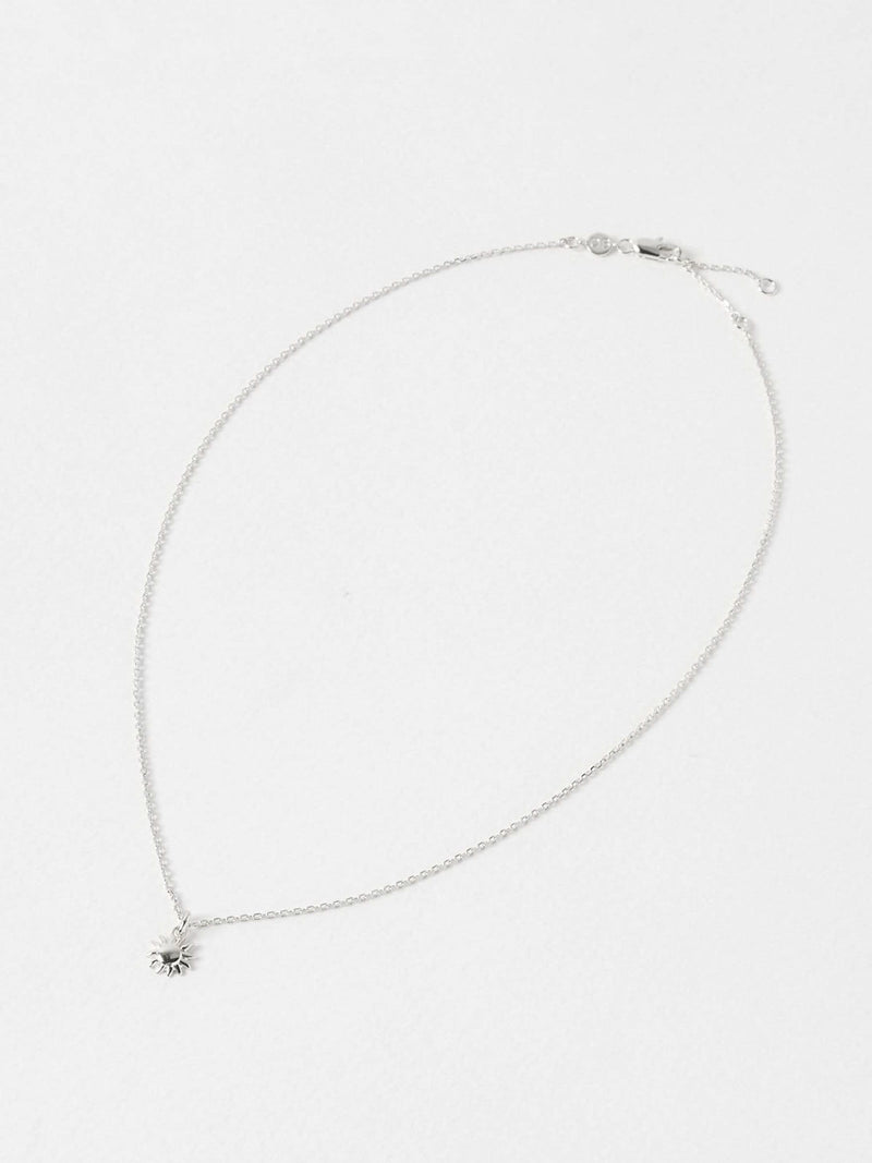 Oliver Bonas sterling silver sun charm pendant necklace, UK version