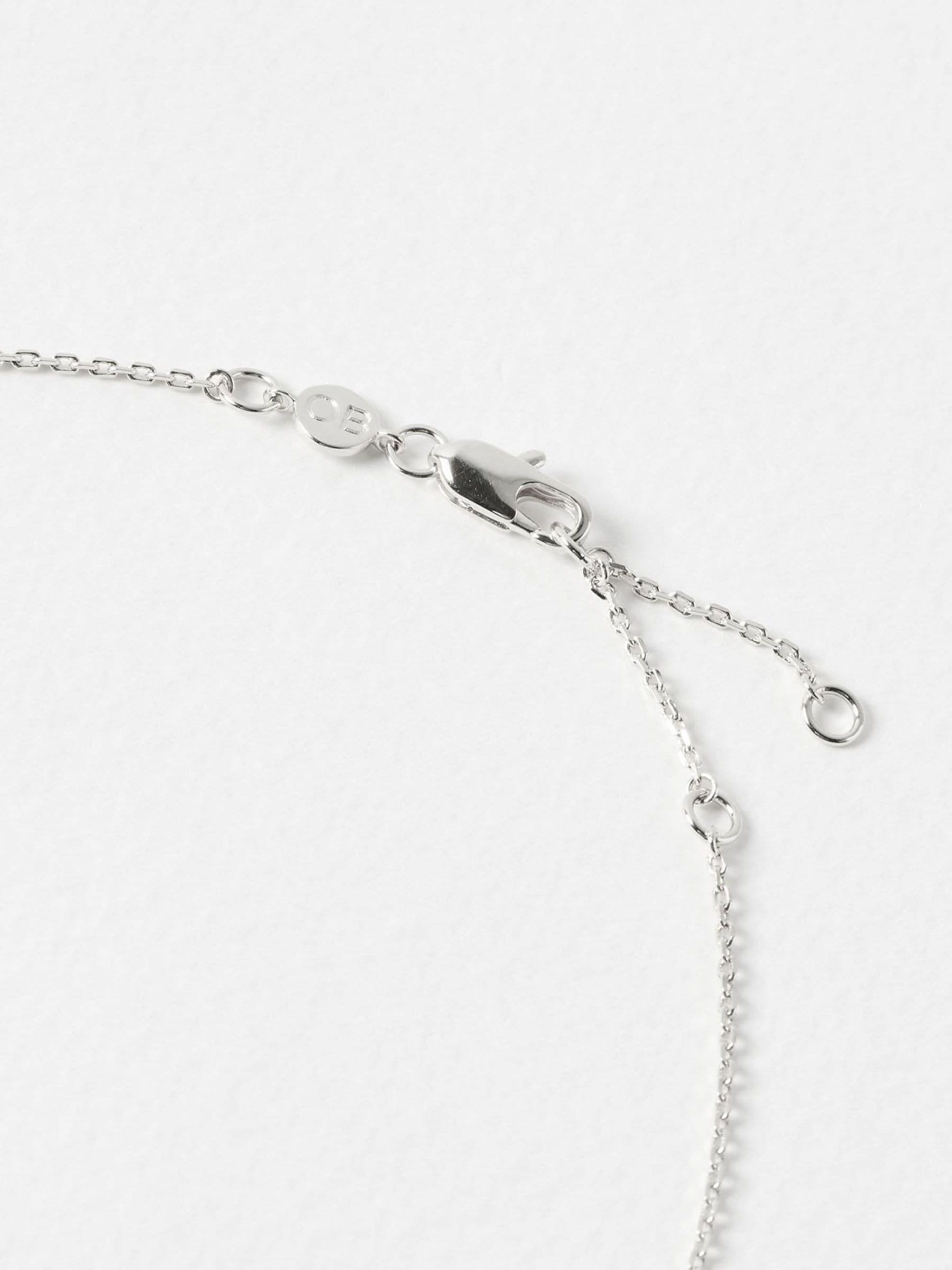 Oliver Bonas sterling silver sun charm pendant necklace, UK version