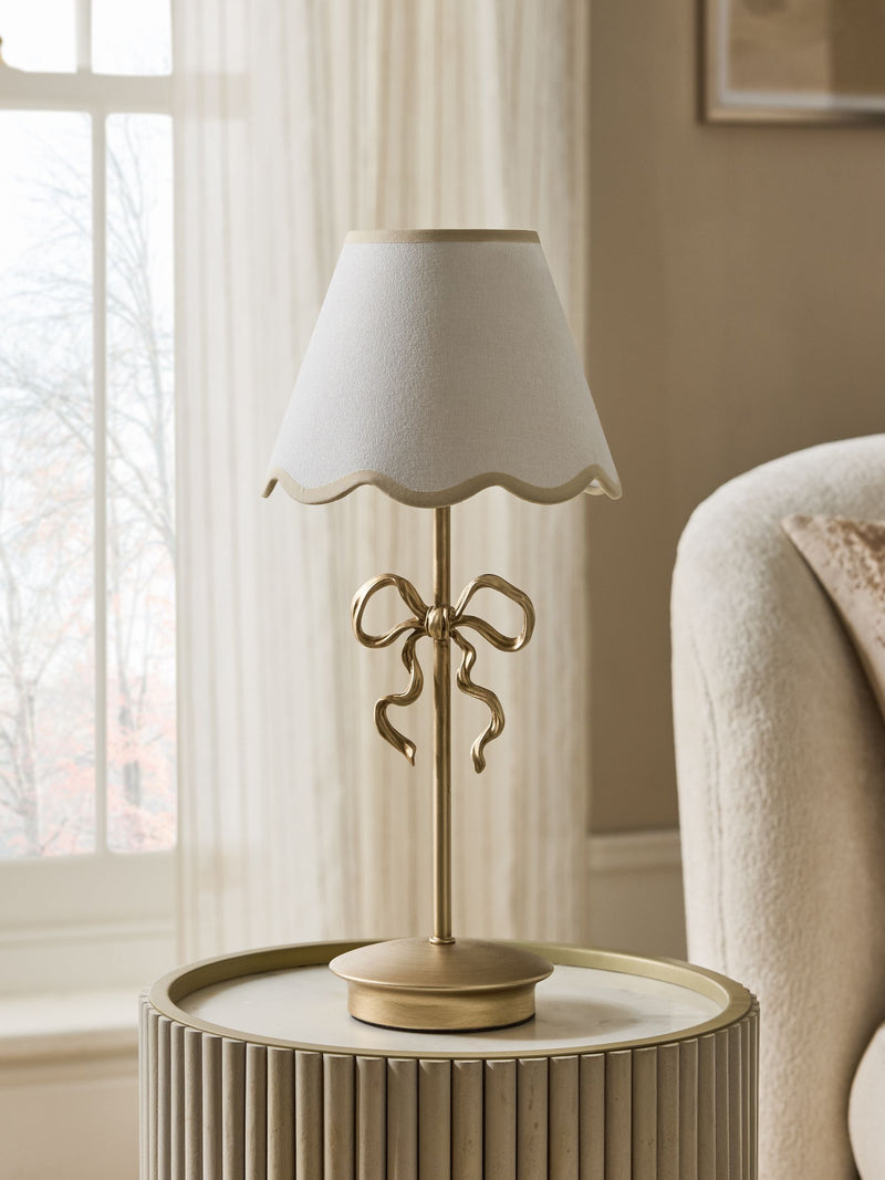 Wireless rechargeable brass bow table lamp (British brand)