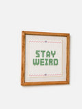 Oliver Bonas Stay Weird petit point framed wall art 31x31cm, imported from the UK