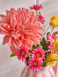 Lucy Tiffney pink artificial dahlia arrangement in striped jug vase, UK version