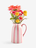 Lucy Tiffney pink artificial dahlia arrangement in striped jug vase, UK version