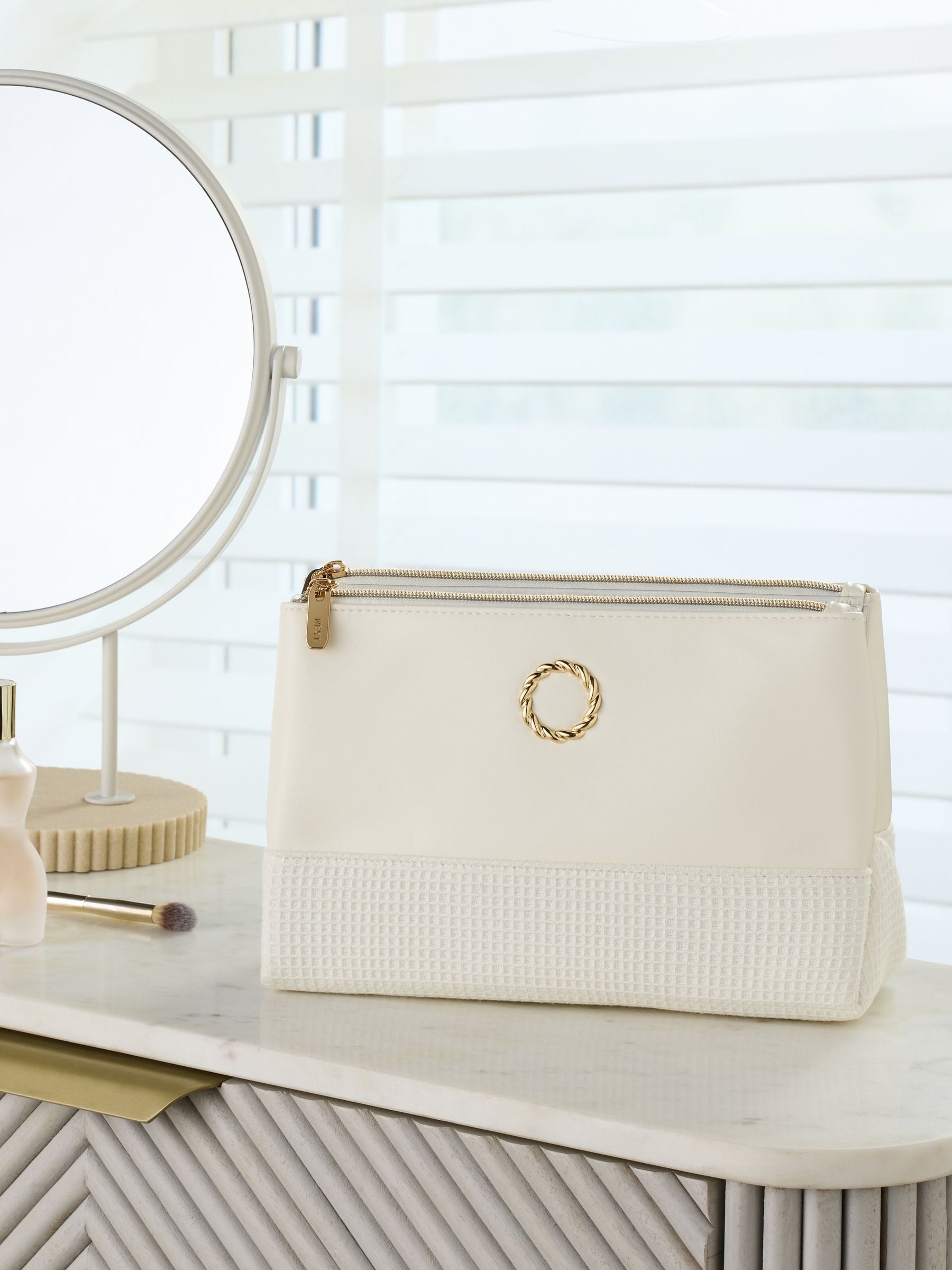 Faux leather foldable make-up bag with transparent compartments, imported from the UK