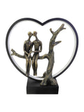 Libra Interiors bronze lovers on branch LED light sculpture 32cm, UK version