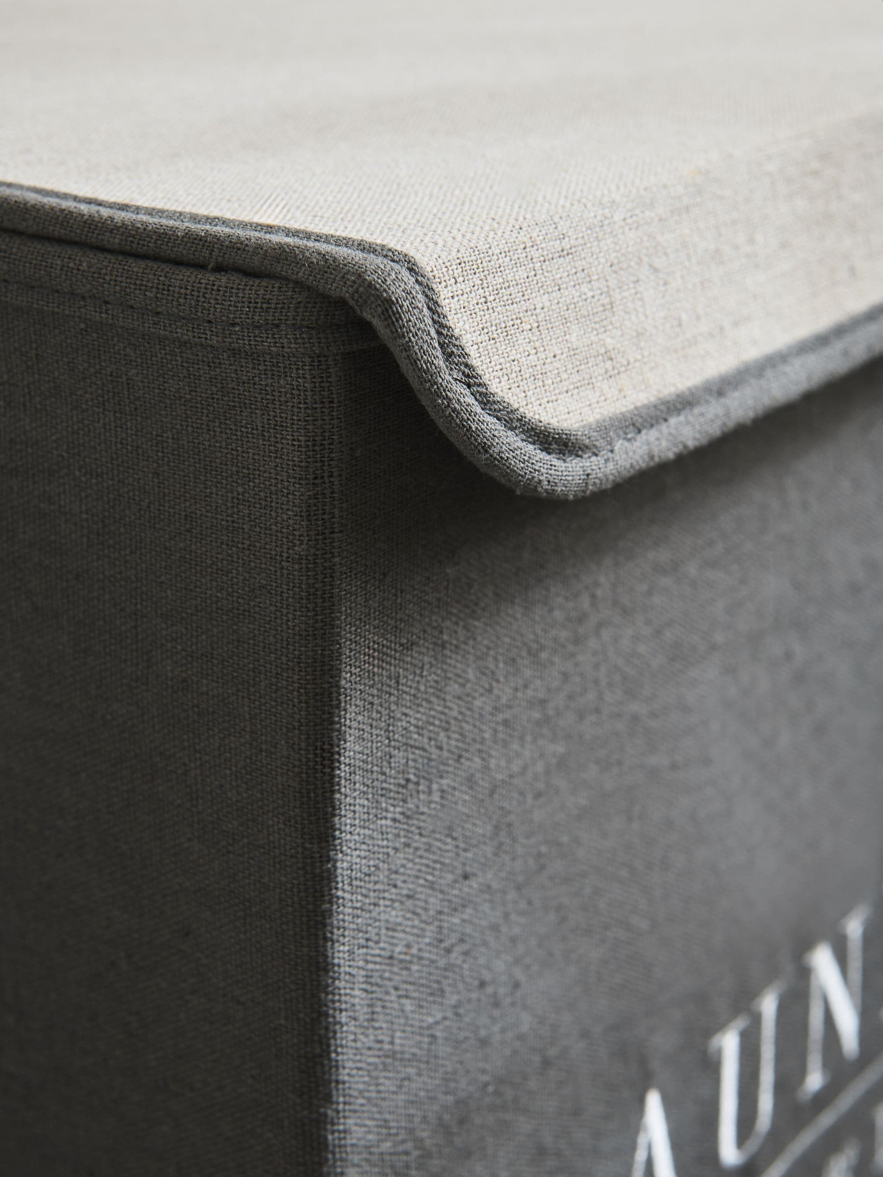 Sage green laundry sorter basket with embroidered detail - British product