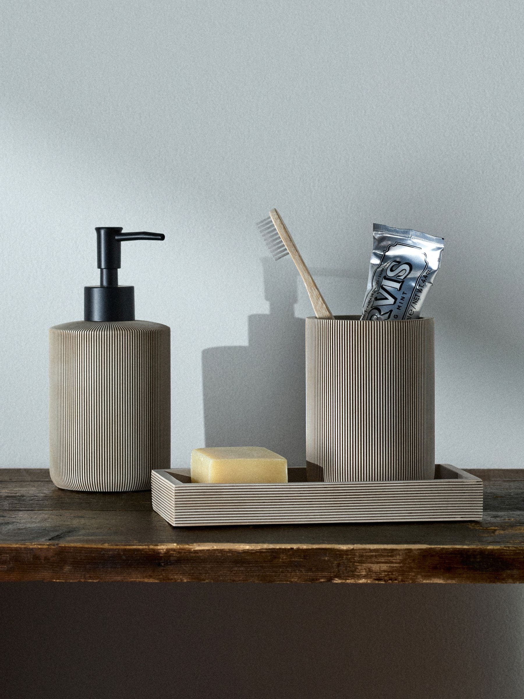 Beige 3-piece bathroom set includes toothbrush tidy and tray, UK version