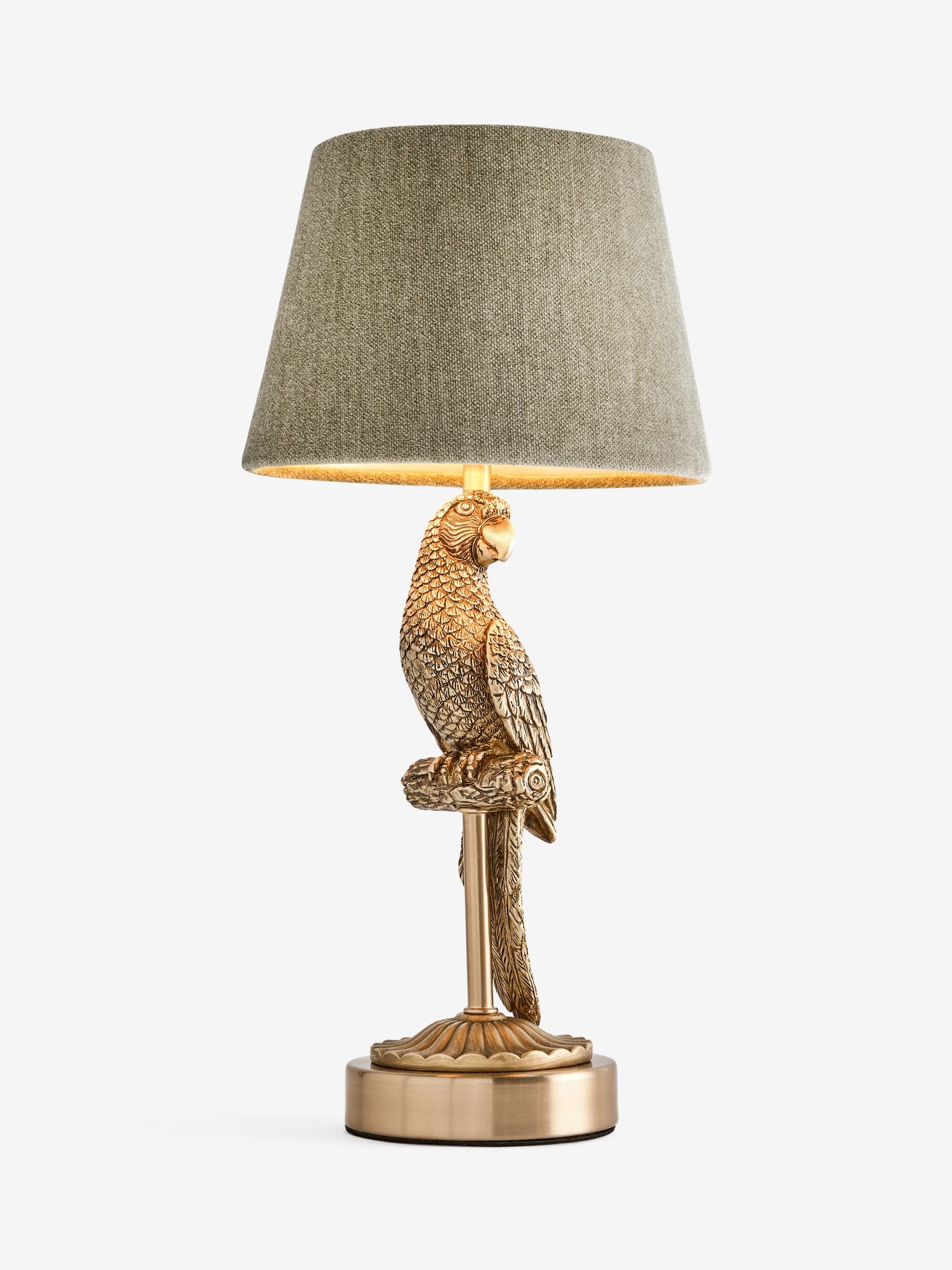 Gold Coco Parrot rechargeable wireless table lamp in brass and olive green, UK version