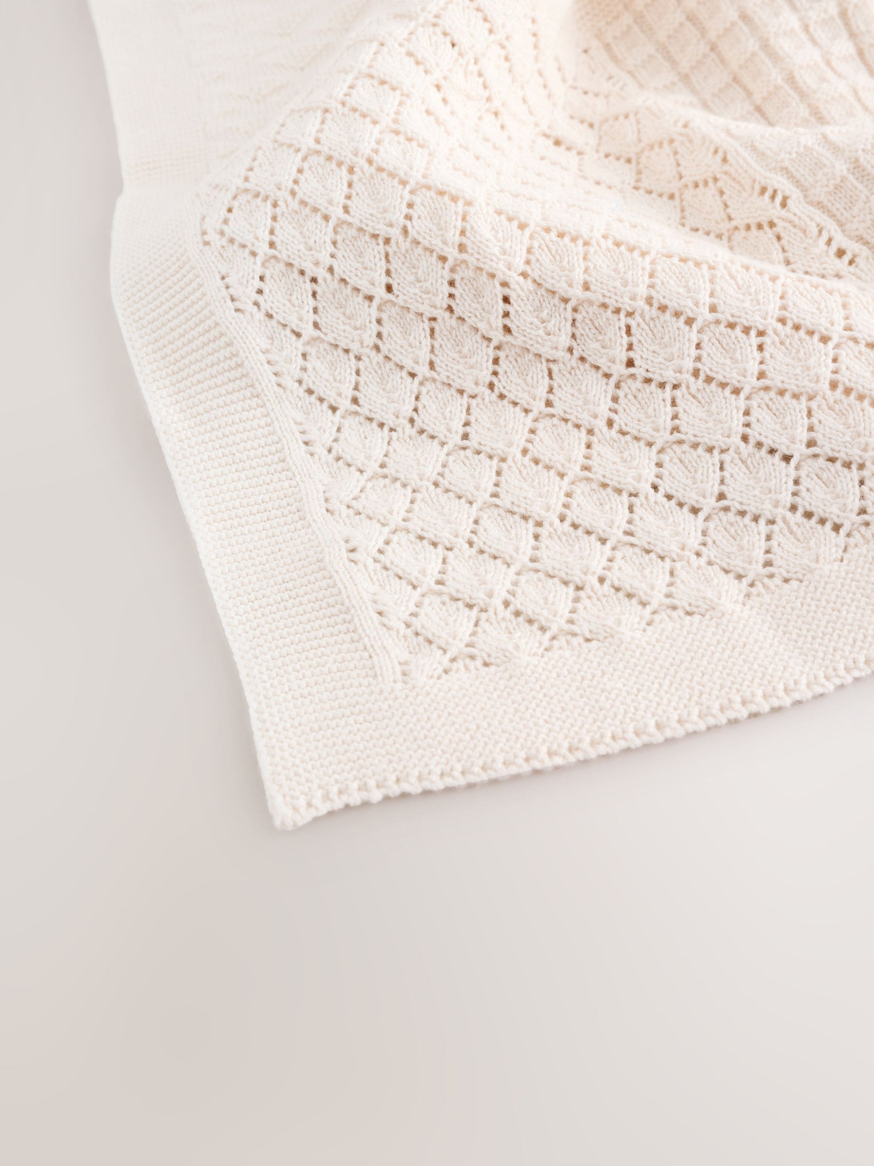 Cream knitted patchwork baby blanket - British product