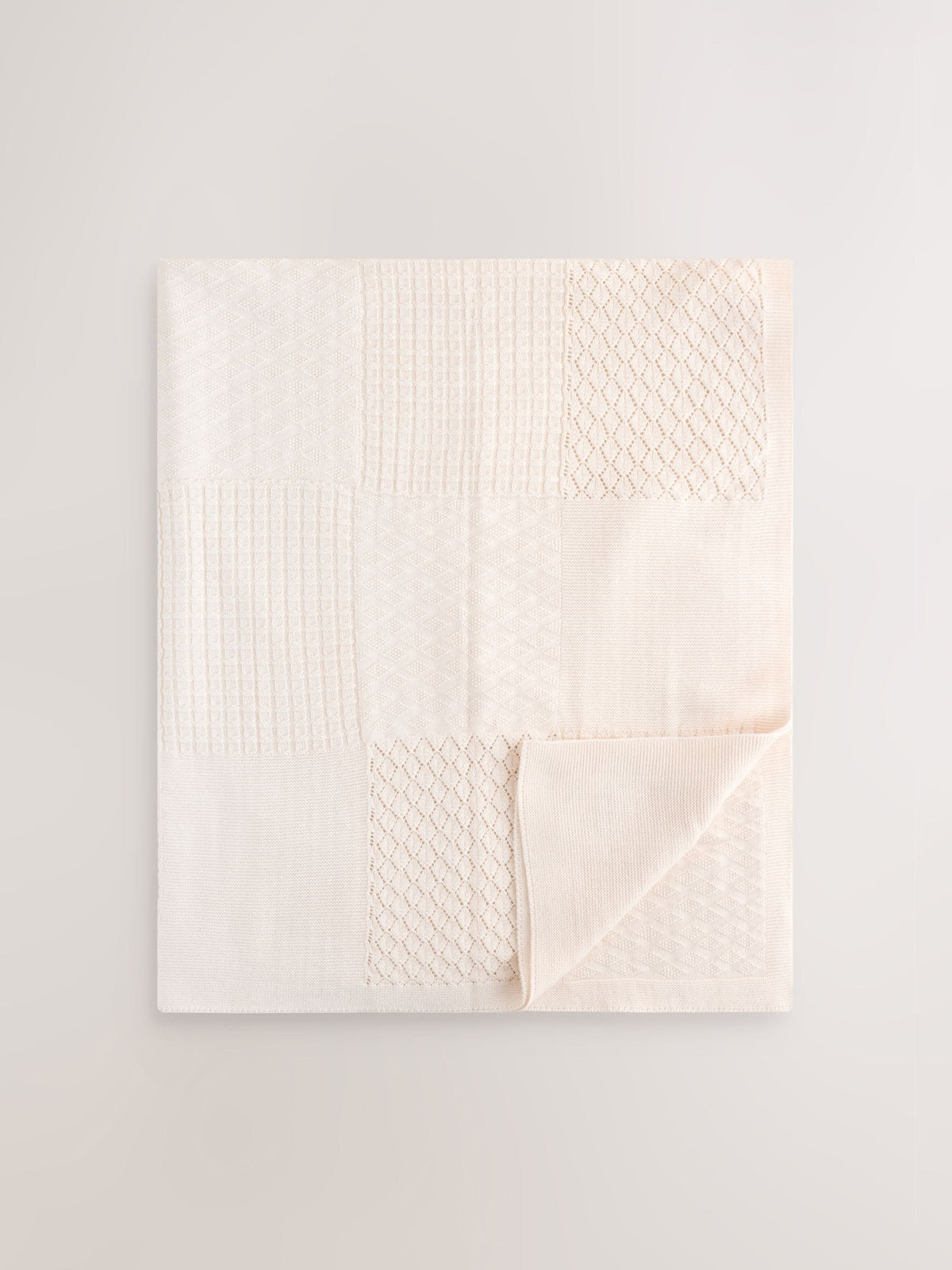 Cream knitted patchwork baby blanket - British product