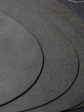 Mikasa black pebble-shaped faux leather placemat set of 4, imported from the UK