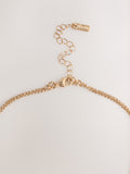 Gold tone two row pavé heart necklace - British product