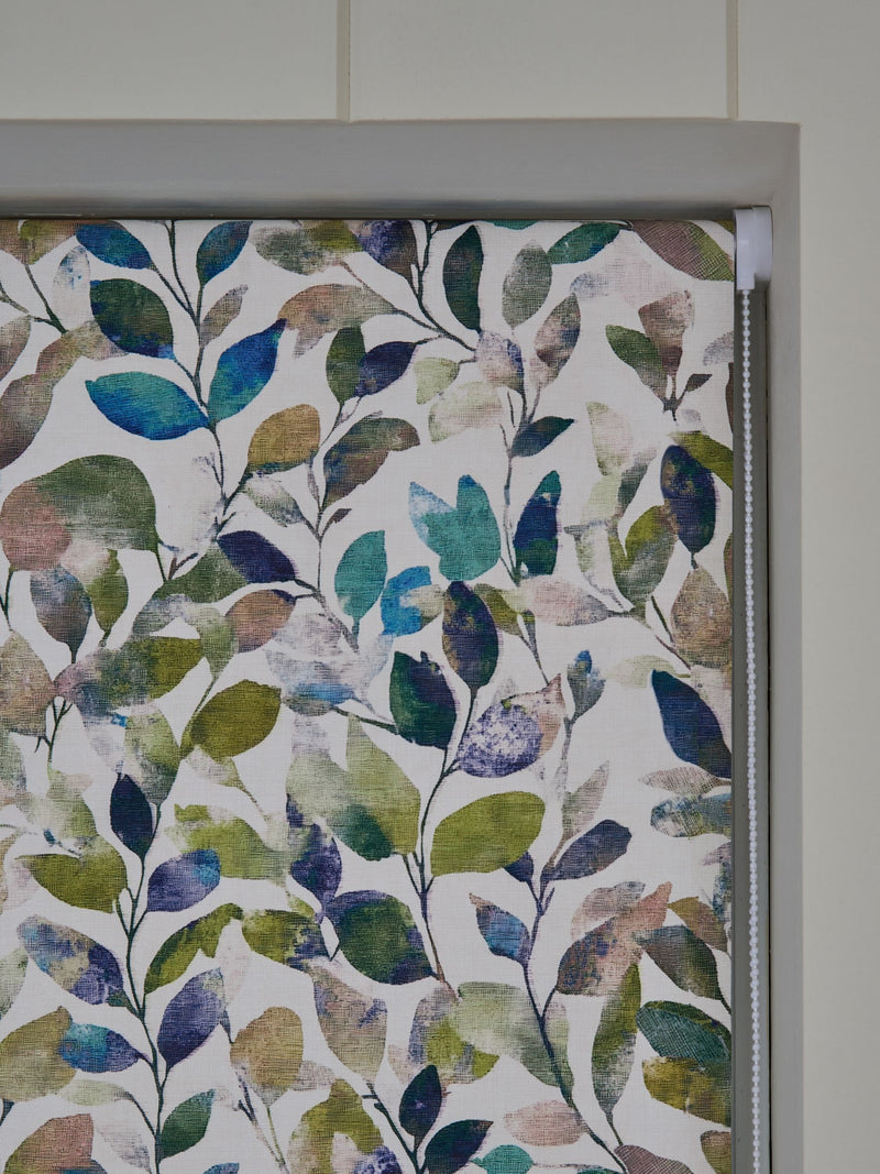 Multicoloured leaf print blackout roller blind, imported from the UK