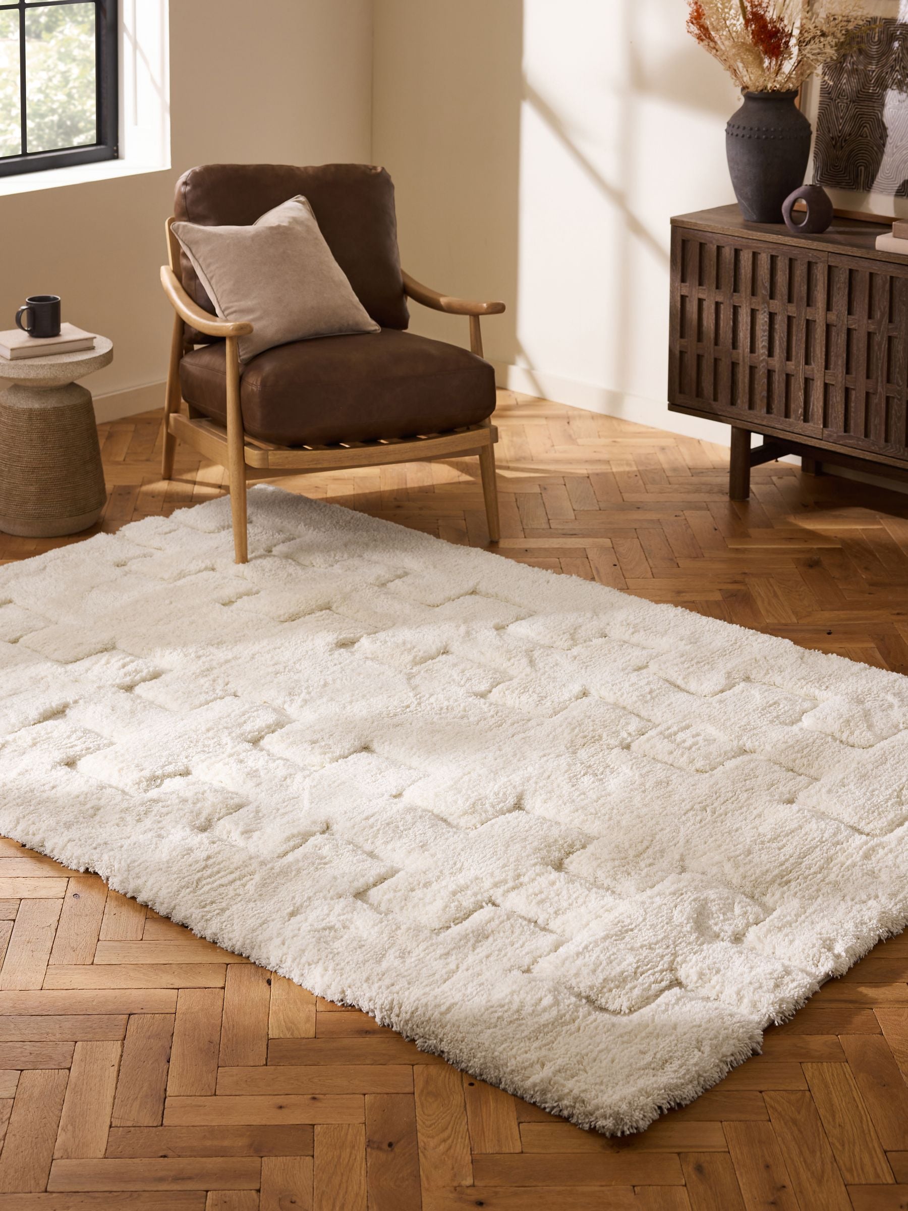 Carved geo shaggy rug, light natural, soft high-pile texture (British brand)