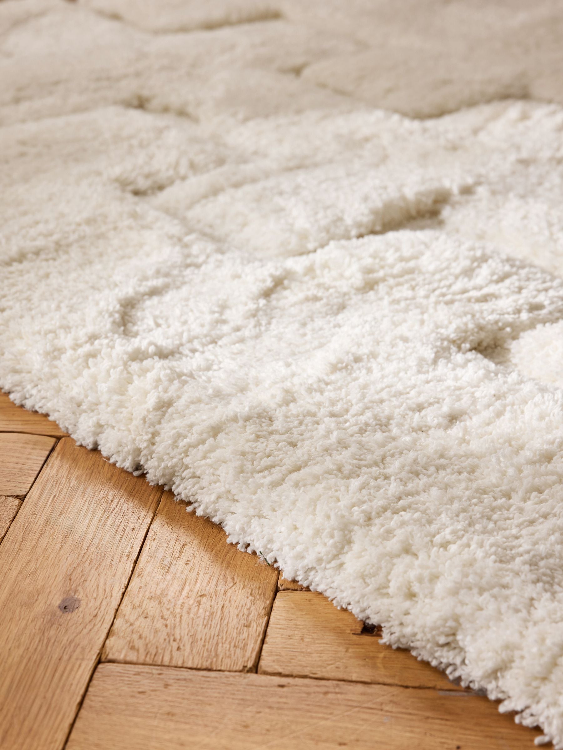 Carved geo shaggy rug, light natural, soft high-pile texture (British brand)