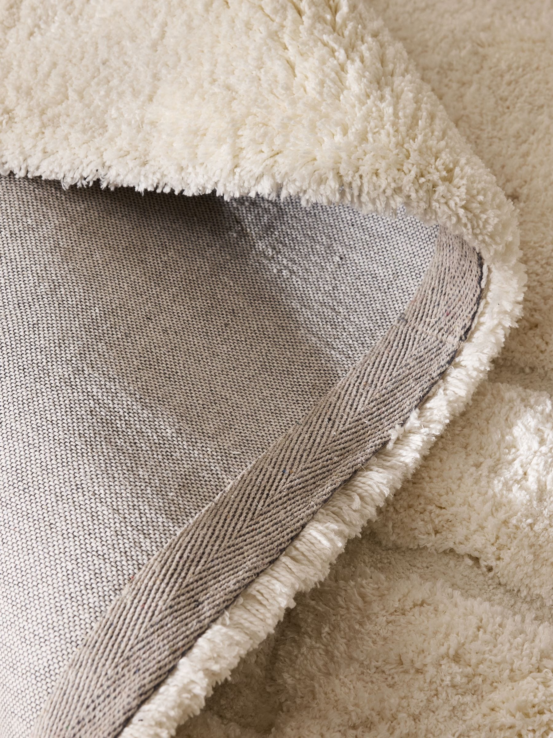 Carved geo shaggy rug, light natural, soft high-pile texture (British brand)